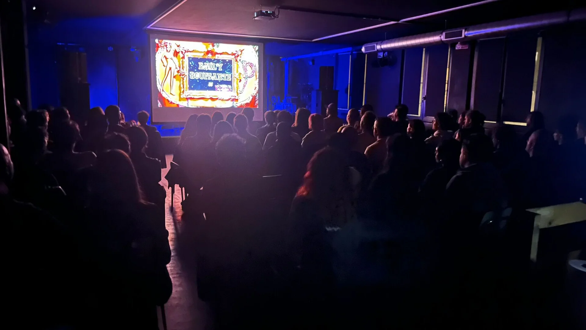 A room full of people watching Pervirella at Cine Underdround Festival